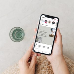Image of hands holding a mobile phone