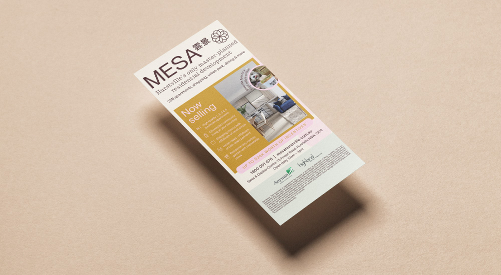 Image of flyer design hovering on beige desk